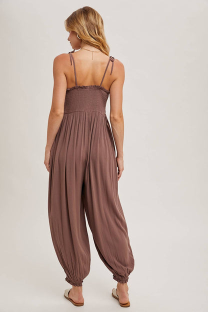 GAUZE SMOCKED BUTTON FRONT SHOULDER TIE JUMPSUIT